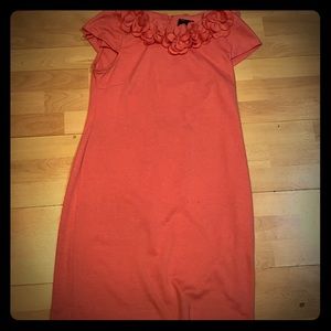 orange dress with flower collar